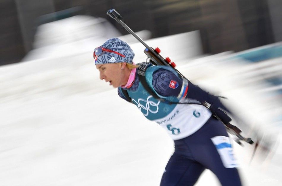Kuzmina Wins Biathlon Sprint in Norway; Takes Overall World Cup Lead