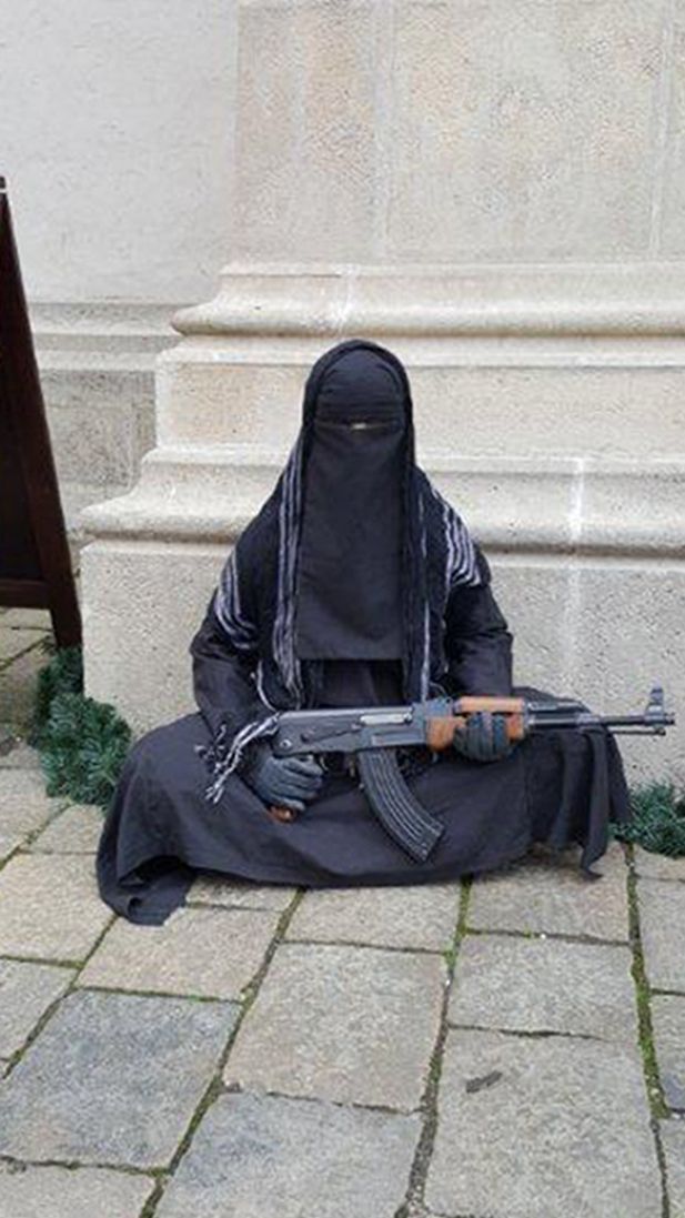 Life-size Mock-up Gunman Placed at Door of Bratislava Cathedral